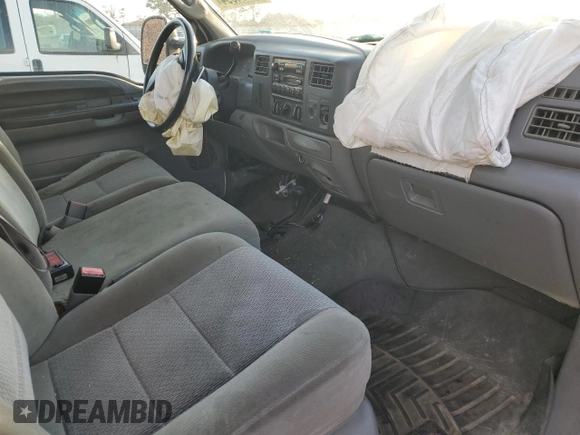 2003 Ford F-250 XL z VIN 1FTNF21L83ED10378, wystawiony jako Copart lot #78414894 z przebiegiem 158 936 mil mil oraz Szkoda całkowita • Salvage title. Historia ofert i sprzedaży dostępna na DreamBid. Obrazek 8.
