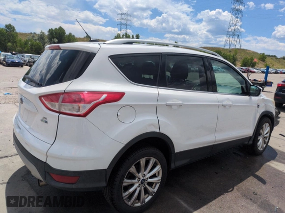 2013 Ford Escape SE with VIN 1FMCU9GX9DUD12210, listed as a Copart auction lot 62496095 with 77,516 mi miles and Salvage title. Bid and sale history available at DreamBid. Image 3.