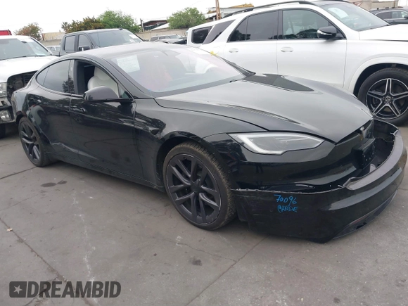 2022 Tesla Model S with VIN 5YJSA1E55NF474342, listed as a IAAI auction lot 41870994 with 33,804 mi miles and . Bid and sale history available at DreamBid. Image 1.