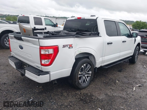 2023 Ford F-150 XL with VIN 1FTEW1EP5PFB87582, listed as a IAAI auction lot 42254015 with 10,476 mi miles and . Bid and sale history available at DreamBid. Image 4.