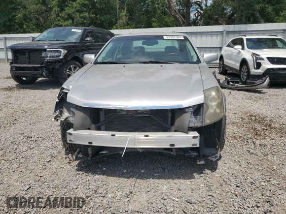 2006 Cadillac CTS with VIN 1G6DM57T860124659, listed as a Copart auction lot 57287985 with 141,162 mi miles and Salvage title. Bid and sale history available at DreamBid. Image 5.