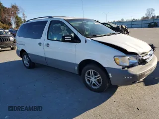 2000 Toyota Sienna LE with VIN 4T3ZF13C5YU201708, listed as a Copart auction lot 83924024 with 219,940 mi miles and Salvage Title. Bid and sale history available at carsss.com. Image 4.