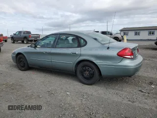 2006 Ford Taurus SE z VIN 1FAFP53U76A109890, wystawiony jako Copart lot #57135575 z przebiegiem 160 750 mil mil oraz Szkoda całkowita • Salvage title. Historia ofert i sprzedaży dostępna na DreamBid. Obrazek 2.