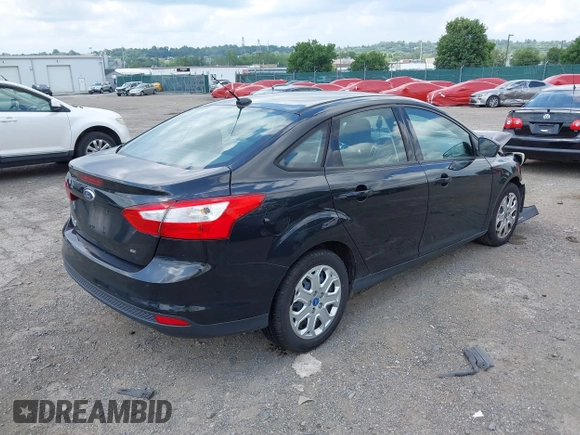 2012 Ford Focus SE z VIN 1FAHP3F26CL157551, wystawiony jako IAAI lot #42697232 z przebiegiem 135 024 mil mil oraz . Historia ofert i sprzedaży dostępna na DreamBid. Obrazek 4.