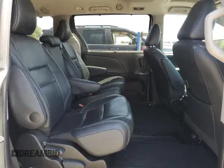 2015 Toyota Sienna SE with VIN 5TDXK3DC6FS656949, listed as a Copart auction lot 54114955 with 112,642 mi miles and Salvage Title. Bid and sale history available at DreamBid. Image 11.