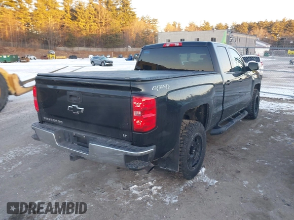 2014 Chevrolet Silverado 1500 LT with VIN 1GCVKREC0EZ399955, listed as a IAAI auction lot 41328346 with 111,162 mi miles and . Bid and sale history available at DreamBid. Image 4.