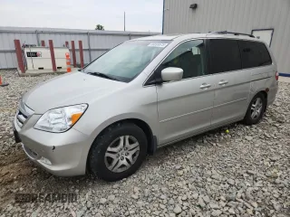 2005 Honda Odyssey EX-L with VIN 5FNRL38765B132111, listed as a Copart auction lot 58899575 with 226,634 mi miles and Non repairable. Bid and sale history available at DreamBid. Image 1.