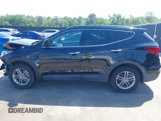 2017 Hyundai Santa Fe 2.4L z VIN 5NMZU3LB4HH024307, wystawiony jako IAAI lot #42147423 z przebiegiem 72 504 mil mil oraz . Historia ofert i sprzedaży dostępna na DreamBid. Obrazek 14.