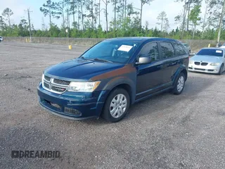 2014 Dodge Journey SE Plus with VIN 3C4PDCAB2ET149735, listed as a IAAI auction lot 41928241 with 150,348 mi miles and . Bid and sale history available at DreamBid. Image 2.