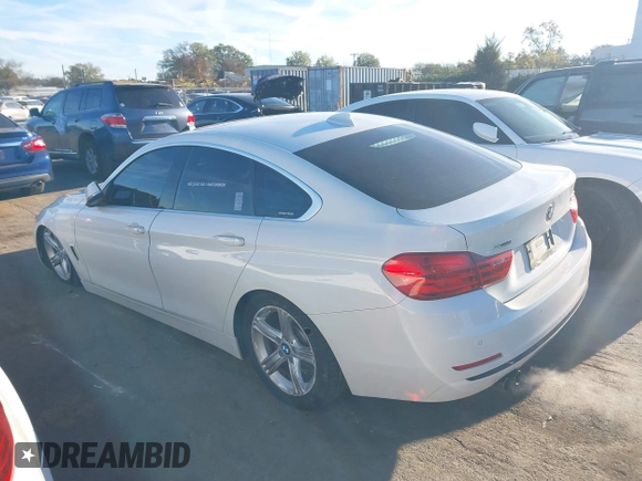 2016 BMW 4 Series 428i xDrive with VIN WBA4C9C54GG139275, listed as a IAAI auction lot 40828786 with 128,124 mi miles and . Bid and sale history available at carsss.com. Image 14.