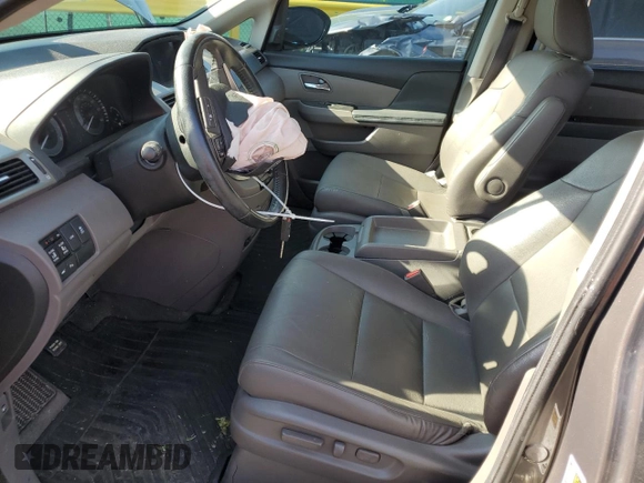2016 Honda Odyssey Touring Elite with VIN 5FNRL5H91GB092214, listed as a Copart auction lot 61158745 with 121,477 mi miles and Salvage title. Bid and sale history available at DreamBid. Image 7.