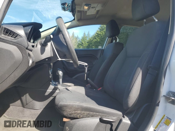 2018 Ford Fiesta SE with VIN 3FADP4EJ1JM128130, listed as a Copart auction lot 50574285 with 141,002 mi miles and Salvage Title. Bid and sale history available at DreamBid. Image 7.