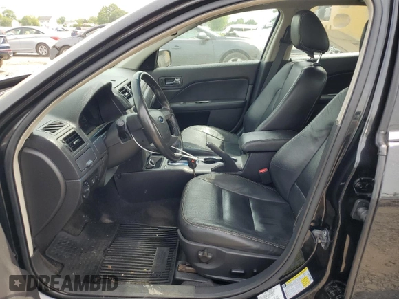 2010 Ford Fusion Hybrid с VIN 3FADP0L34AR129353, выставлен на аукционе Copart как лот 58310725 с пробегом 237 662 миль миль и Списание • Salvage title. История ставок и продаж доступна на DreamBid. Изображение 7.