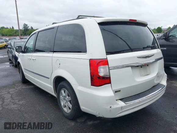 2013 Chrysler Town & Country Touring with VIN 2C4RC1BG7DR629829, listed as a IAAI auction lot 42152230 with 188,473 mi miles. Bid and sale history available at carsss.com. Image 3.