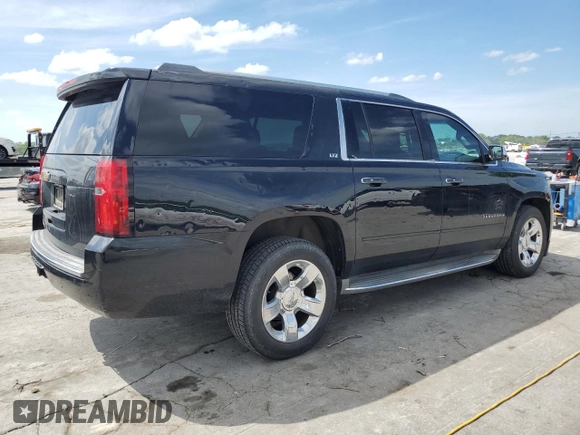 2015 Chevrolet Suburban LTZ with VIN 1GNSCKKC9FR151532, listed as a Copart auction lot 54209315 with 122,380 mi miles and Salvage title. Bid and sale history available at DreamBid. Image 3.