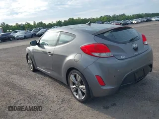 2013 Hyundai Veloster w/Gray Int with VIN KMHTC6AD3DU118515, listed as a IAAI auction lot 42336158 with 109,563 mi miles and . Bid and sale history available at DreamBid. Image 3.