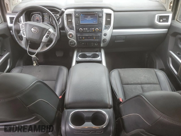 2017 Nissan Titan Pro-4X with VIN 1N6AA1E53HN570548, listed as a Copart auction lot 71663224 with 128,024 mi miles and Salvage title. Bid and sale history available at DreamBid. Image 8.