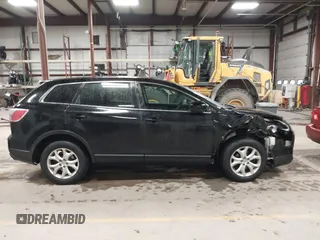 2011 Mazda CX-9 Sport with VIN JM3TB3BV9B0313270, listed as a IAAI auction lot 41474571 with 149,302 mi miles and . Bid and sale history available at DreamBid. Image 13.