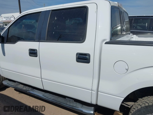 2014 Ford F-150 XL with VIN 1FTFW1ET3EFA89424, listed as a IAAI auction lot 42066869 with 163,110 mi miles. Bid and sale history available at carsss.com. Image 15.