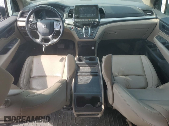 2020 Honda Odyssey Touring z VIN 5FNRL6H86LB036888, wystawiony jako Copart lot #58781675 z przebiegiem 130 329 mil mil oraz Szkoda całkowita • Salvage title. Historia ofert i sprzedaży dostępna na DreamBid. Obrazek 8.