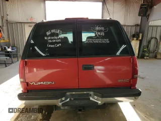 1999 GMC Yukon with VIN 1GKEK13R0XJ768859, listed as a Copart auction lot 84005304 with 190,960 mi miles and Salvage Title. Bid and sale history available at carsss.com. Image 6.