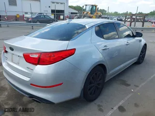 2015 Kia Optima EX with VIN 5XXGN4A70FG360623, listed as a IAAI auction lot 42112315 with 262,058 mi miles. Bid and sale history available at carsss.com. Image 4.