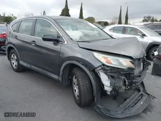 2015 Honda CR-V LX with VIN 3CZRM3H39FG706958, listed as a IAAI auction lot 41549880 with 85,567 mi miles. Bid and sale history available at carsss.com. Image 1.