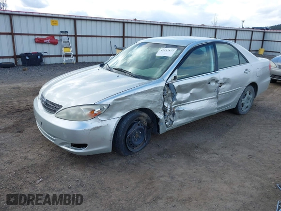 2004 Toyota Camry LE with VIN JTDBE32K640257695, listed as a IAAI auction lot 41837872 with 214,917 mi miles. Bid and sale history available at carsss.com. Image 2.