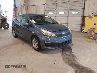 2016 Kia Rio LX with VIN KNADM4A38G6660555, listed as a IAAI auction lot 41754811 with 127,534 mi miles. Bid and sale history available at carsss.com. Image 1.