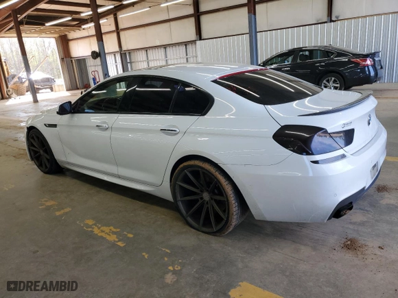 2015 BMW 6 Series 650i with VIN WBA6B2C5XFD799226, listed as a Copart auction lot 51317235 with 128,464 mi miles and Clean Title. Bid and sale history available at carsss.com. Image 2.