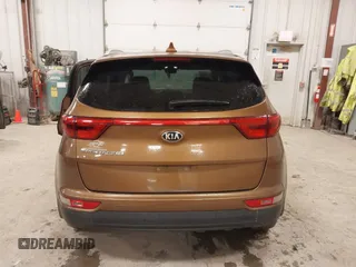 2018 Kia Sportage LX with VIN KNDPM3AC2J7381114, listed as a IAAI auction lot 41214824 with 82,178 mi miles and . Bid and sale history available at carsss.com. Image 16.