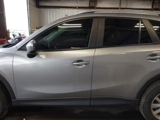 2015 Mazda CX-5 Sport z VIN JM3KE2BE8F0434889, wystawiony jako IAAI lot #42259894 z przebiegiem 298 835 mil mil oraz . Historia ofert i sprzedaży dostępna na DreamBid. Obrazek 14.