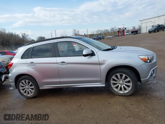 2011 Mitsubishi Outlander SE z VIN JA4AP4AU6BZ018195, wystawiony jako IAAI lot #41909830 z przebiegiem 68 576 mil mil oraz . Historia ofert i sprzedaży dostępna na DreamBid. Obrazek 13.