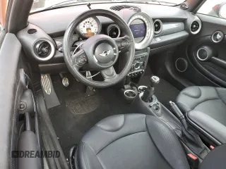 2013 MINI Hardtop S with VIN WMWSV3C57DT477948, listed as a Copart auction lot 54437155 with 63,114 mi miles and Salvage Title. Bid and sale history available at DreamBid. Image 8.