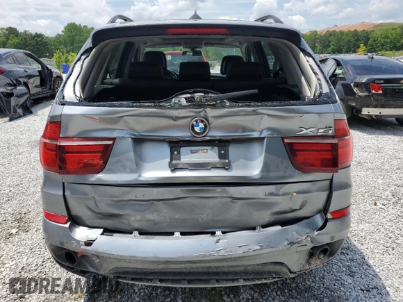 2012 BMW X5 35i with VIN 5UXZV4C50CL991452, listed as a Copart auction lot 56890265 with 147,019 mi miles and Salvage title. Bid and sale history available at DreamBid. Image 6.