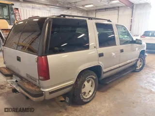 1996 Chevrolet Tahoe Limited with VIN 1GNEC13R4TJ318772, listed as a IAAI auction lot 41953820 with 250,262 mi miles. Bid and sale history available at carsss.com. Image 4.