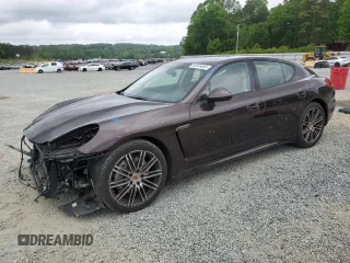 2016 Porsche Panamera 4 z VIN WP0AA2A7XGL007121, wystawiony jako Copart lot #54559365 z przebiegiem 84 955 mil mil oraz Szkoda całkowita • Salvage title. Historia ofert i sprzedaży dostępna na DreamBid. Obrazek 1.