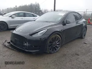 2021 Tesla Model Y Performance z VIN 5YJYGDEF2MF215938, wystawiony jako IAAI lot #41338287 z przebiegiem 63 925 mil mil oraz . Historia ofert i sprzedaży dostępna na DreamBid. Obrazek 19.