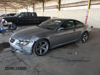 2006 BMW M6 with VIN WBSEH934X6B797428, listed as a Copart auction lot 63462135 with 73,393 mi miles and Salvage title. Bid and sale history available at DreamBid. Image 1.