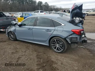2023 Honda Civic Sedan Touring with VIN 2HGFE1F95PH313835, listed as a Copart auction lot 45145875 with 52,344 mi miles and Salvage Title. Bid and sale history available at carsss.com. Image 2.