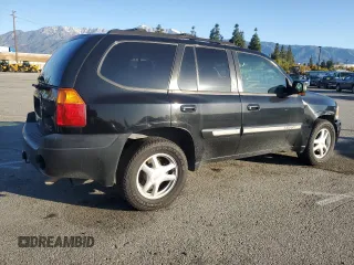 2002 GMC Envoy SLT with VIN 1GKDS13S522485892, listed as a Copart auction lot 49248615 with 152,326 mi miles and Salvage Title. Bid and sale history available at carsss.com. Image 3.