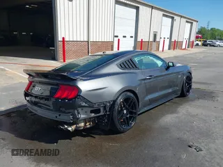 2018 Ford Mustang GT z VIN 1FA6P8CF3J5182601, wystawiony jako IAAI lot #41661225 z przebiegiem 67 898 mil mil oraz . Historia ofert i sprzedaży dostępna na DreamBid. Obrazek 4.