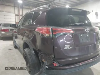 2018 Toyota RAV4 LE with VIN 2T3BFREV0JW759714, listed as a IAAI auction lot 41823084 with 119,909 mi miles and . Bid and sale history available at DreamBid. Image 6.