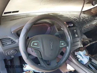 2015 Lincoln MKZ с VIN 3LN6L2JK3FR616535, выставлен на аукционе IAAI как лот 41898478 с пробегом Не указан миль и . История ставок и продаж доступна на DreamBid. Изображение 13.