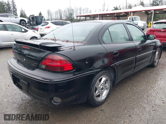 2004 Pontiac Grand Am GT z VIN 1G2NW52E64M677552, wystawiony jako IAAI lot #41101595 z przebiegiem 100 644 mil mil oraz . Historia ofert i sprzedaży dostępna na DreamBid. Obrazek 4.