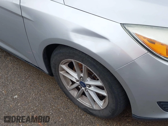 2015 Ford Focus SE with VIN 1FADP3F26FL254588, listed as a IAAI auction lot 42146381 with 99,280 mi miles and . Bid and sale history available at DreamBid. Image 6.
