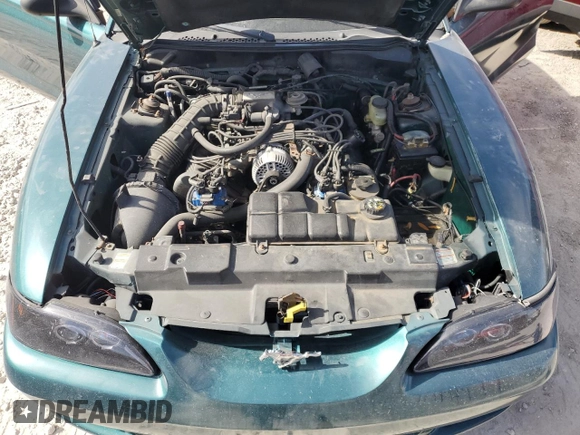 1998 Ford Mustang GT z VIN 1FAFP42X0WF255816, wystawiony jako Copart lot #55011425 z przebiegiem 144 397 mil mil oraz Czysty tytuł • Clean title. Historia ofert i sprzedaży dostępna na DreamBid. Obrazek 11.