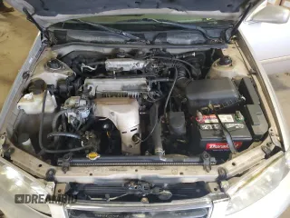 2001 Toyota Camry CE z VIN 4T1BG22K91U101946, wystawiony jako Copart lot #59685795 z przebiegiem 99 347 mil mil oraz Szkoda całkowita • Salvage title. Historia ofert i sprzedaży dostępna na DreamBid. Obrazek 11.