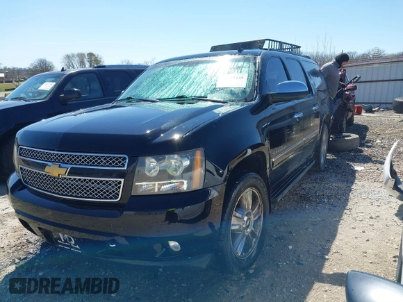 2011 Chevrolet Suburban LTZ with VIN 1GNSKKE33BR380376, listed as a IAAI auction lot 41825445 with 228,715 mi miles and . Bid and sale history available at DreamBid. Image 2.