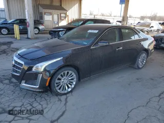 2014 Cadillac CTS Luxury AWD with VIN 1G6AX5SX5E0194073, listed as a Copart auction lot 47919515 with 47,395 mi miles and Salvage Title. Bid and sale history available at DreamBid. Image 1.